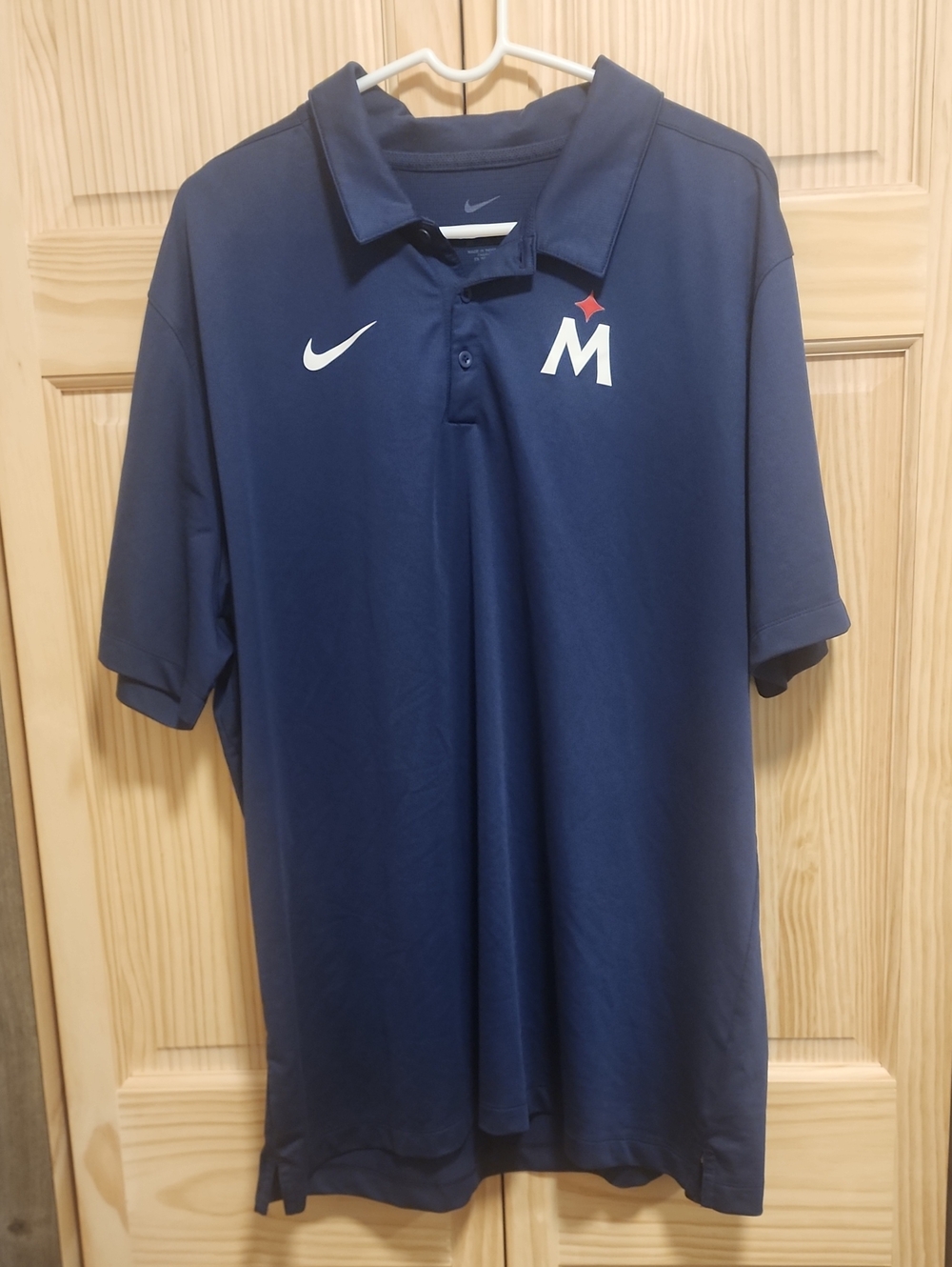 Nike Men’s Navy Blue Polo with White Swoosh and Red Star 'M'